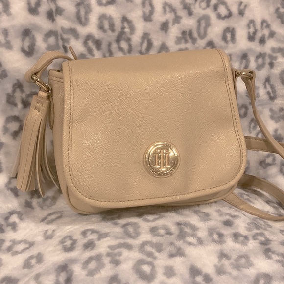 Tommy Hilfiger Handbags - Has a tassel decoration and an adjustable strap.